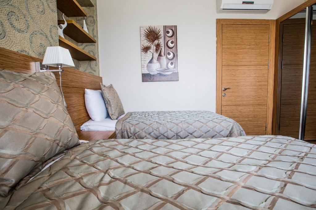 Postel nebo postele na pokoji v ubytování Hattusa Vacation Thermal Club Erzin