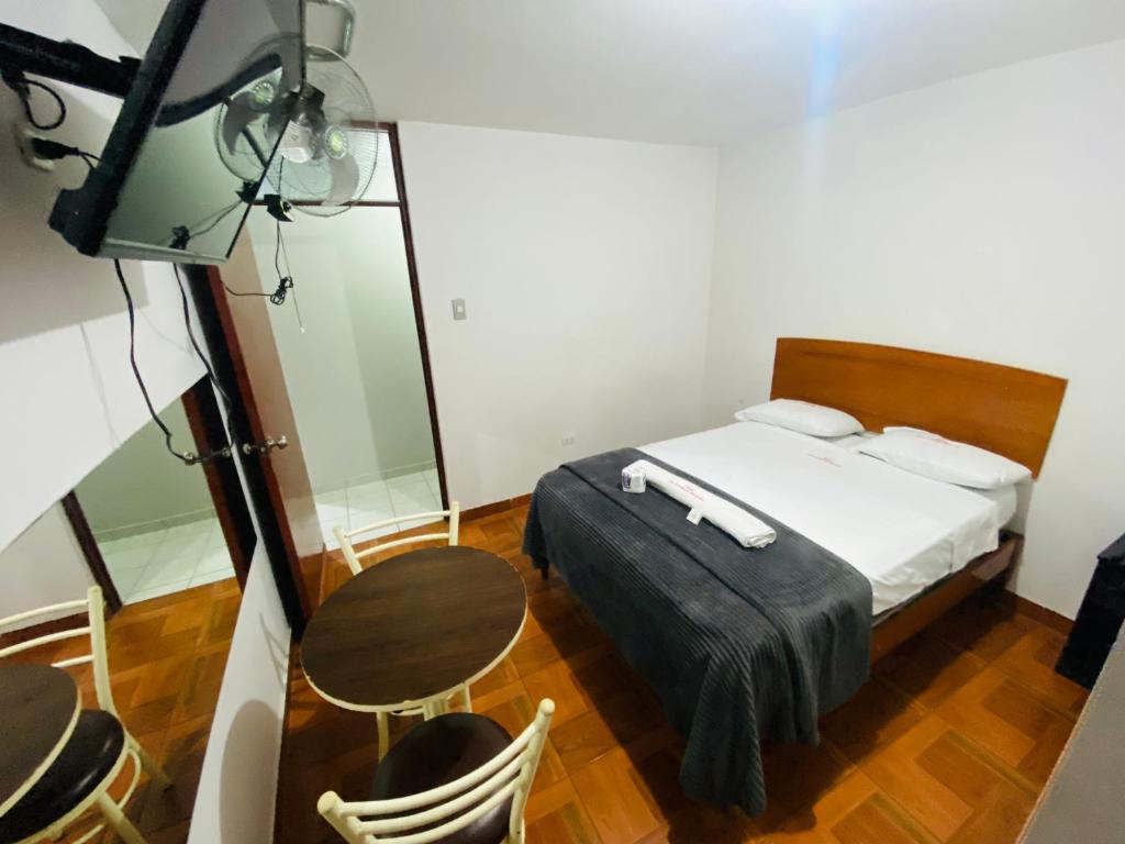 Postel nebo postele na pokoji v ubytování Hotel Peruvians House
