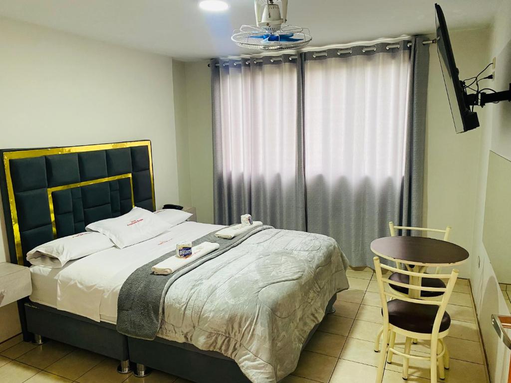 Postel nebo postele na pokoji v ubytování Hotel Peruvians House