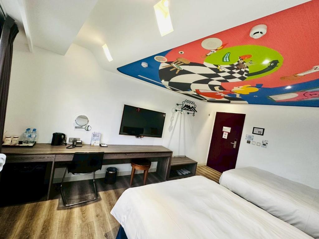 TV a/nebo společenská místnost v ubytování Norway Forest Travel hotel 1 Taichung