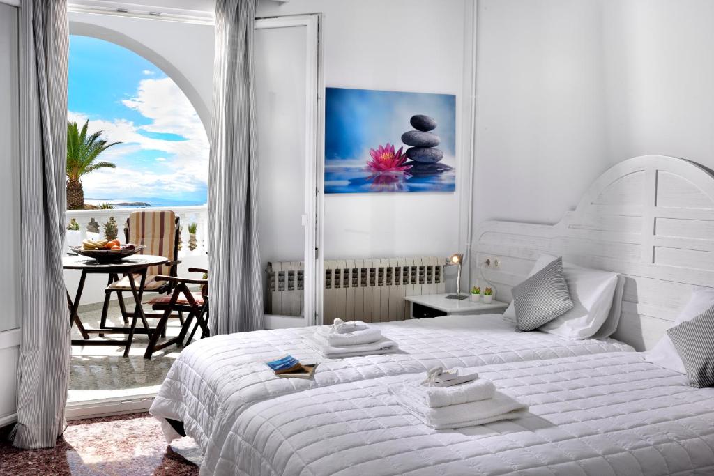 Postel nebo postele na pokoji v ubytování Hotel Nazos 1