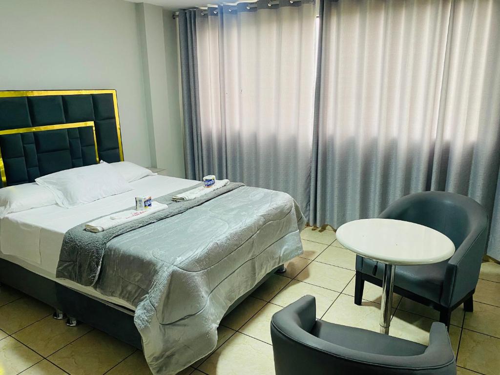 Postel nebo postele na pokoji v ubytování Hotel Peruvians House