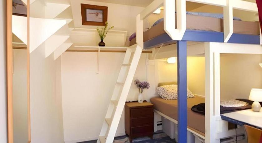 Postel nebo postele na pokoji v ubytování Stables Lodge Backpackers