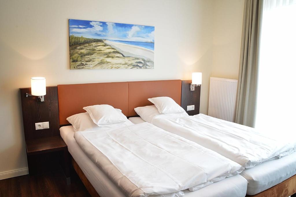 Postel nebo postele na pokoji v ubytování Hotel Drei Linden