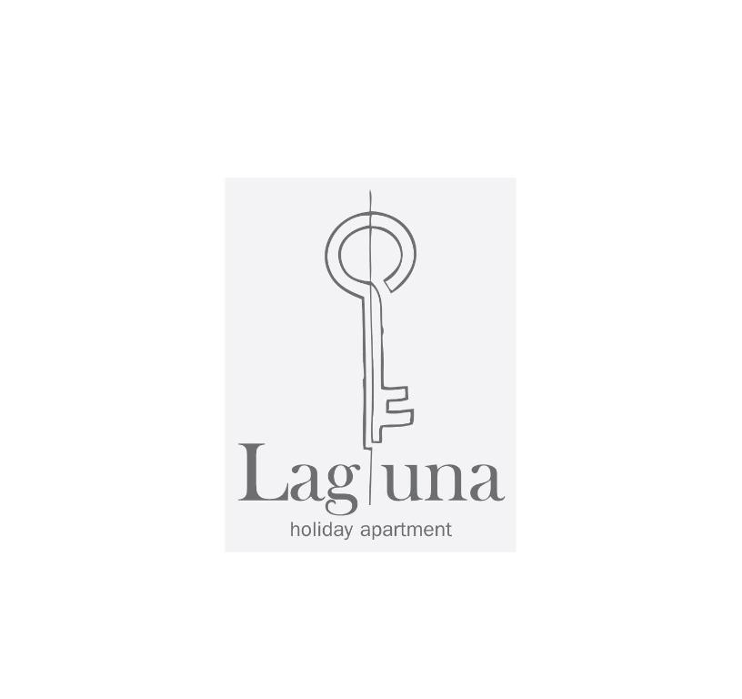 a logo for a laundry department with a key at Apartment Laguna in Vinišće