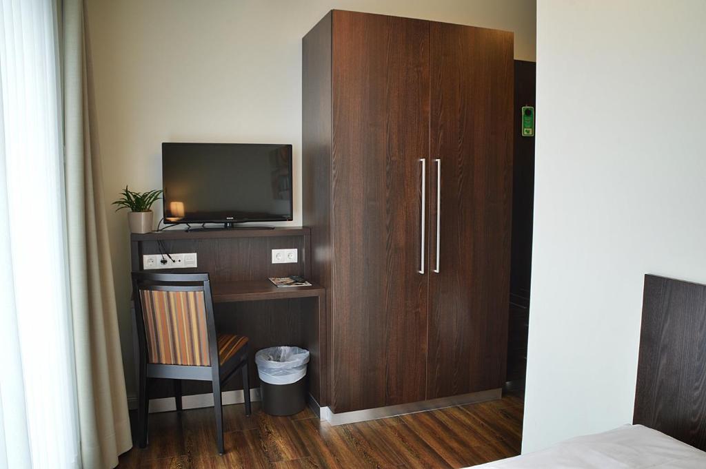 Kuchyň nebo kuchyňský kout v ubytování Hotel Drei Linden