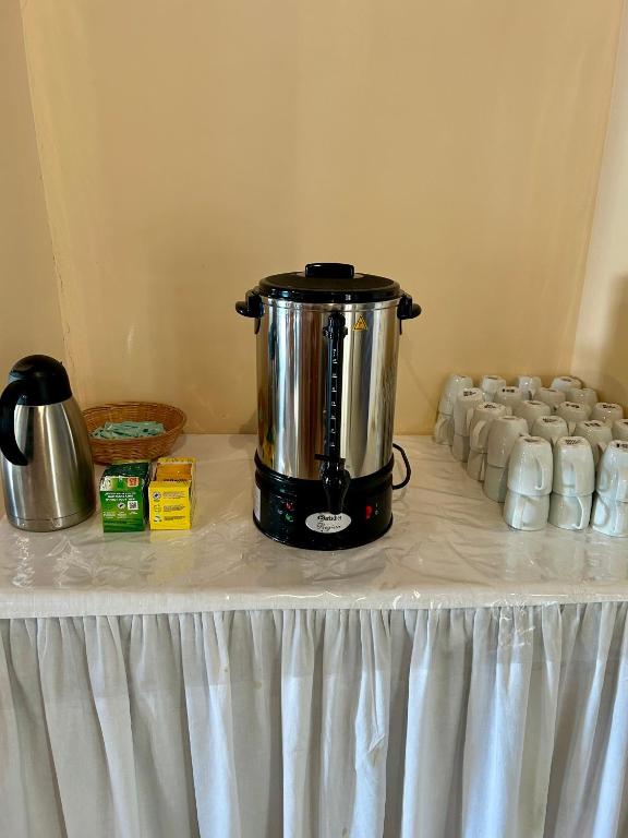 Příslušenství pro přípravu čaje a kávy v ubytování Hotel Galini