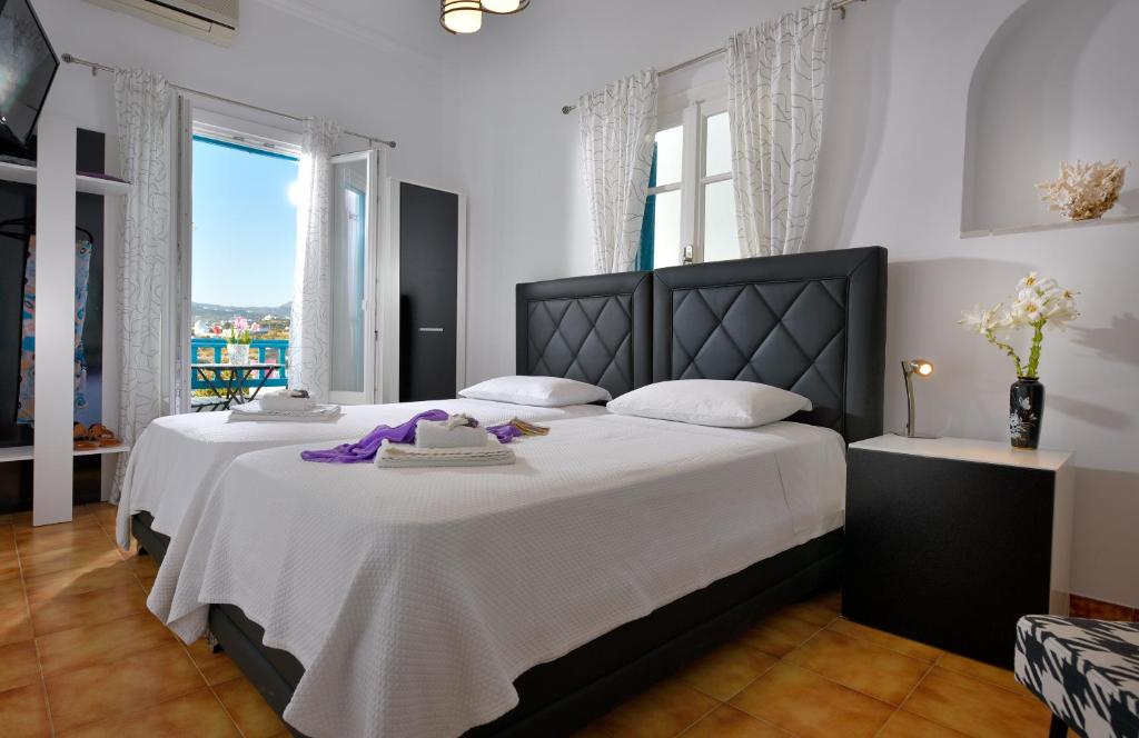 Postel nebo postele na pokoji v ubytování Hotel Nazos 1