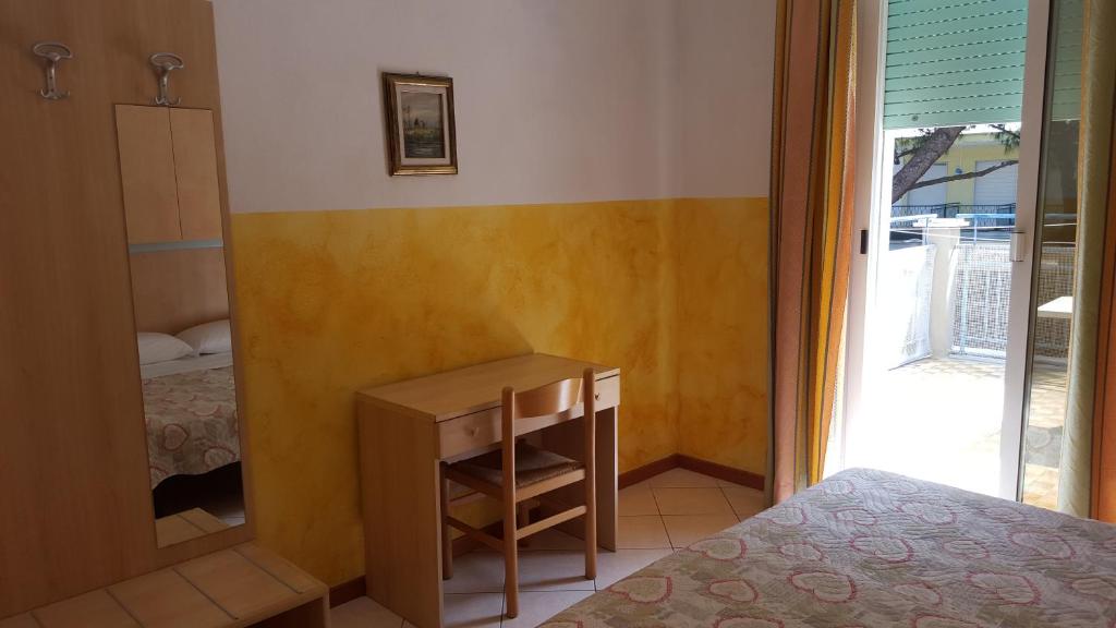 Postel nebo postele na pokoji v ubytování Hotel Canova
