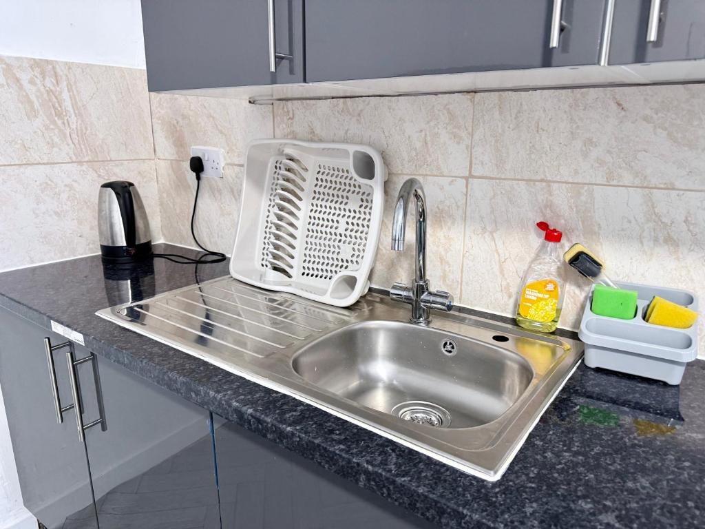 Kuchyň nebo kuchyňský kout v ubytování O5 Property