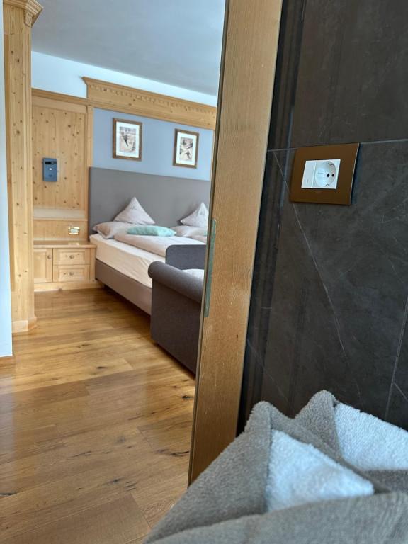 Postel nebo postele na pokoji v ubytování Garnì Villa Erna