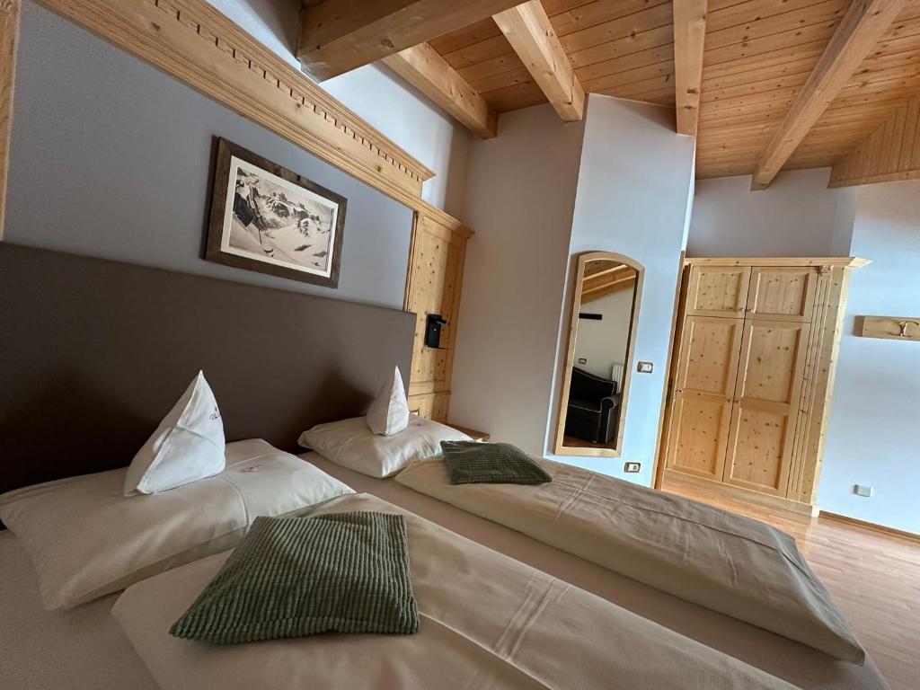Postel nebo postele na pokoji v ubytování Garnì Villa Erna