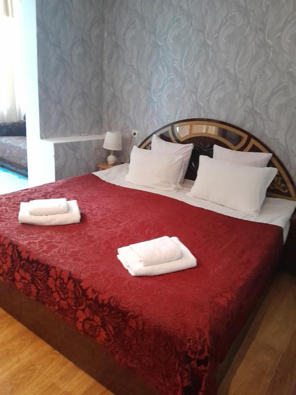 Postel nebo postele na pokoji v ubytování Guesthouse Sumaisha