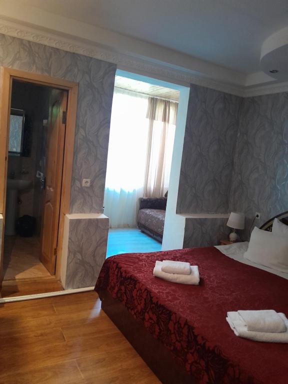 Postel nebo postele na pokoji v ubytování Guesthouse Sumaisha