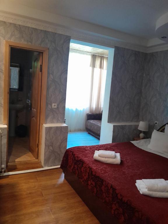 Postel nebo postele na pokoji v ubytování Guesthouse Sumaisha