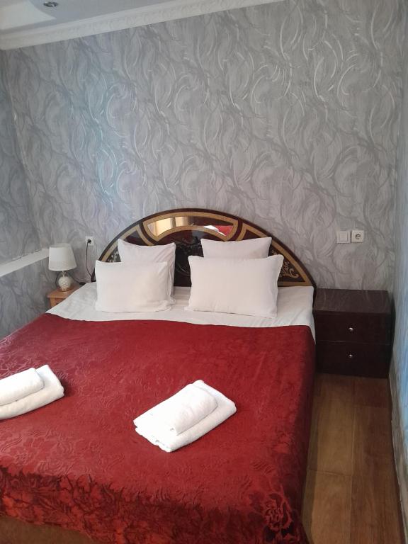 Postel nebo postele na pokoji v ubytování Guesthouse Sumaisha