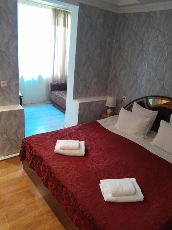 Postel nebo postele na pokoji v ubytování Guesthouse Sumaisha