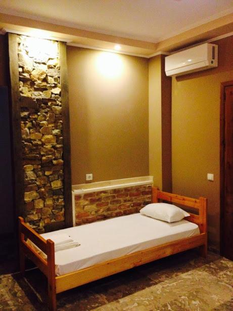 Postel nebo postele na pokoji v ubytování Menis Haus Rooms