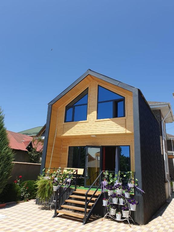 a house with two bikes parked in front of it at Cottage Diamond in Dolinka