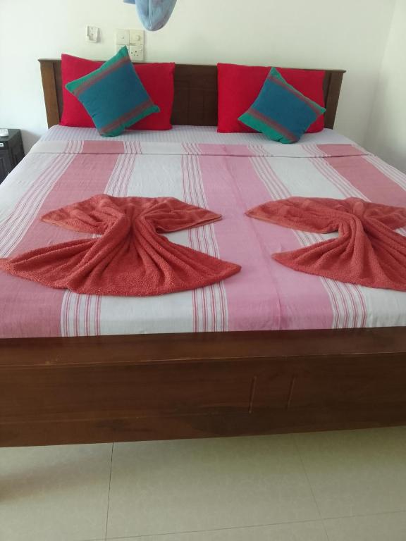 Postel nebo postele na pokoji v ubytování Freedom Home Stay