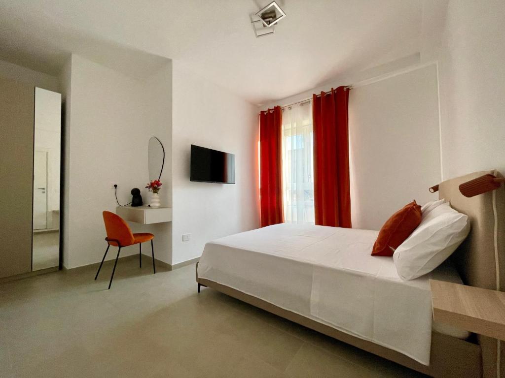 TV a/nebo společenská místnost v ubytování Marephis Rooms - Alghero