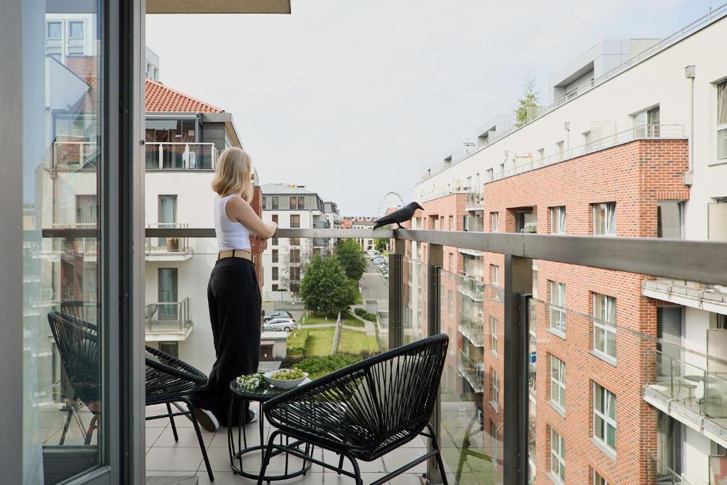 Ein Balkon oder eine Terrasse in der Unterkunft Waterlane Riverside - SPA, Pool, Gym &amp; Parking by Downtown Apartments