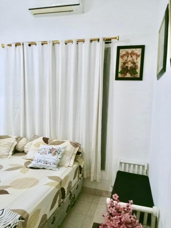 Postel nebo postele na pokoji v ubytování Guest House Abimanyu