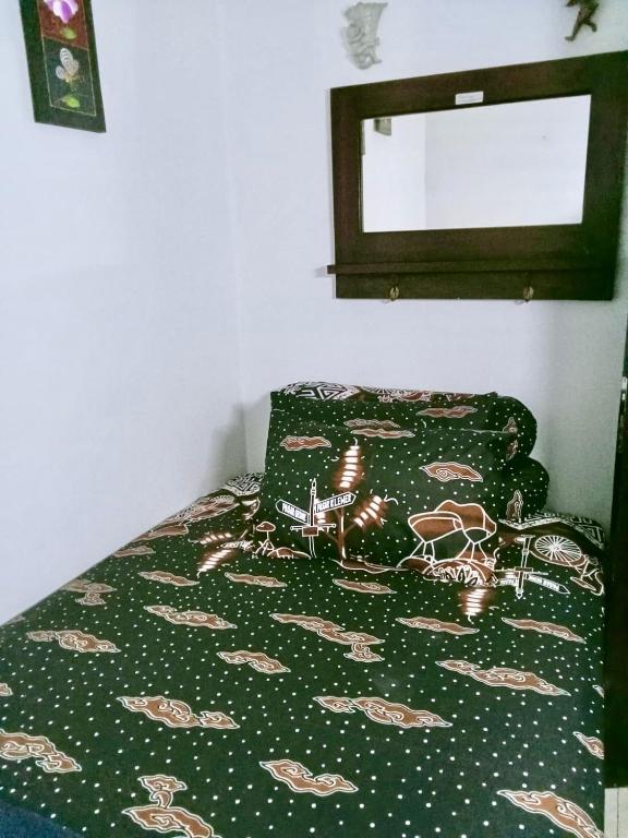 Postel nebo postele na pokoji v ubytování Guest House Abimanyu