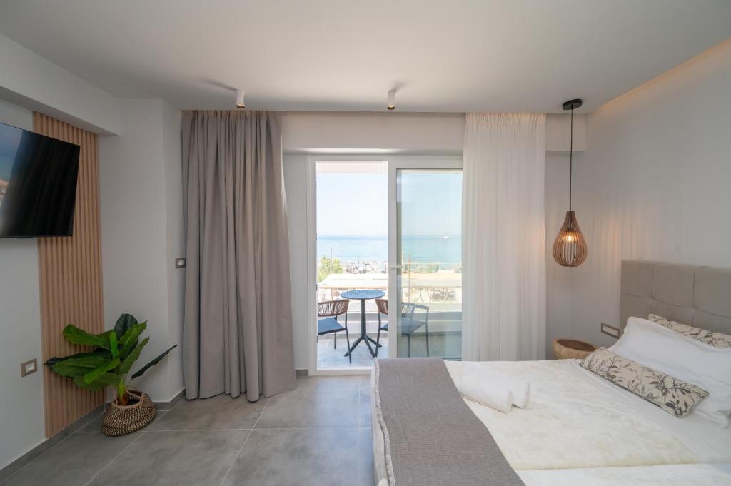 Postel nebo postele na pokoji v ubytování Panorama Seaside