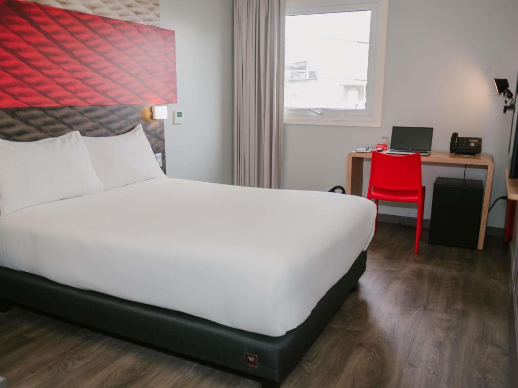 Postel nebo postele na pokoji v ubytování ibis Trujillo