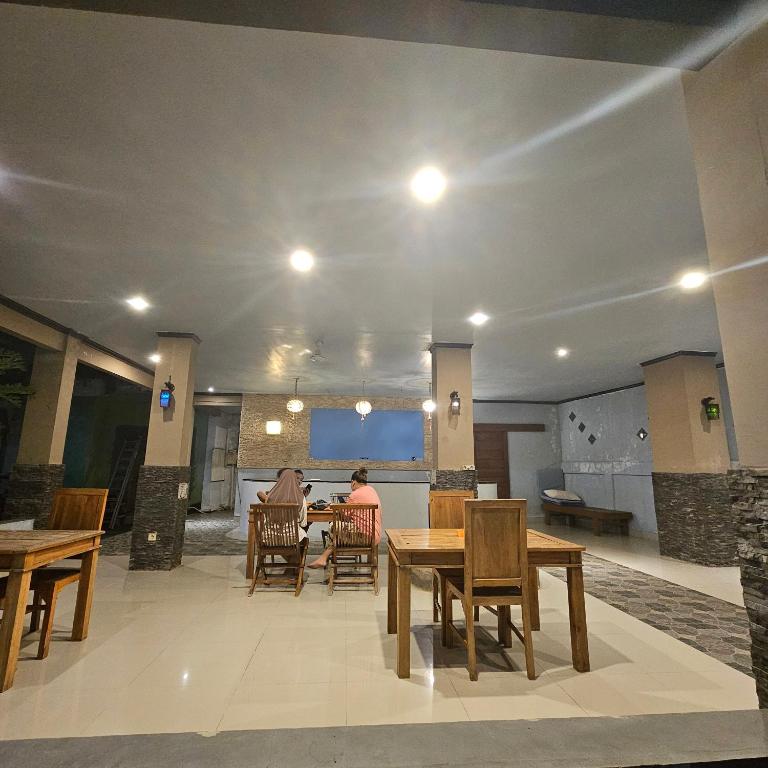 Posezení v ubytování Ridho Malik Hotel