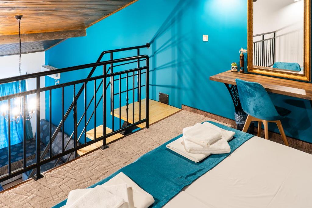 Postel nebo postele na pokoji v ubytování Royal Calisto Hotel