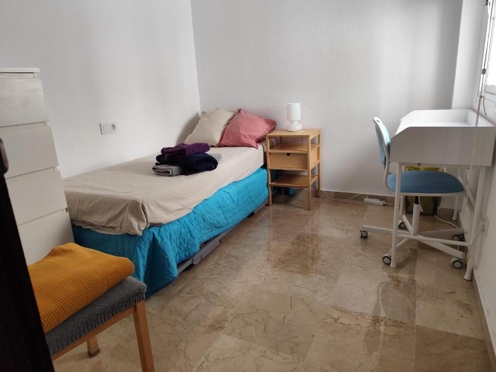 Posteľ alebo postele v izbe v ubytovaní Confortable habitación céntrica en piso privado