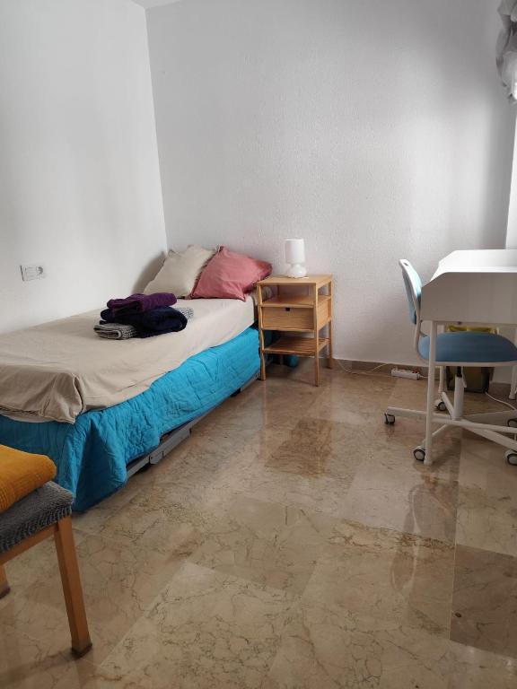 Posteľ alebo postele v izbe v ubytovaní Confortable habitación céntrica en piso privado