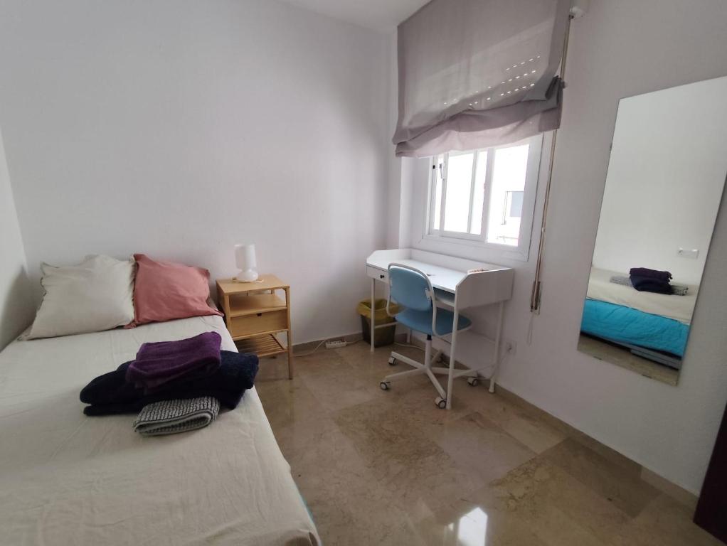 Posteľ alebo postele v izbe v ubytovaní Confortable habitación céntrica en piso privado