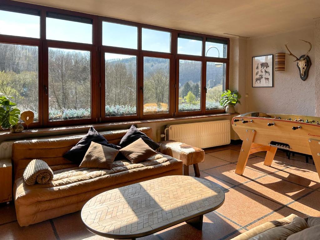 Posezení v ubytování La Vue gîte familial