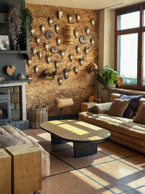 Posezení v ubytování La Vue gîte familial
