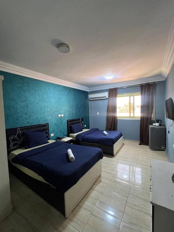 Postel nebo postele na pokoji v ubytování Beko pyramids inn