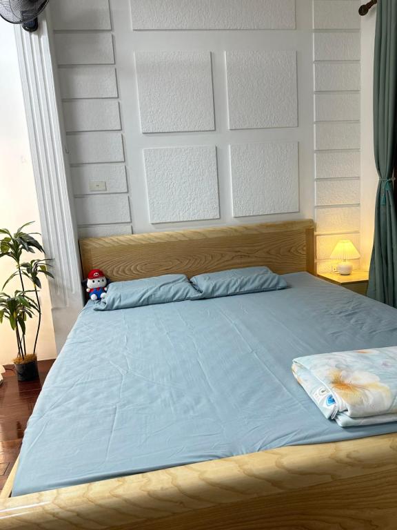 Postel nebo postele na pokoji v ubytování koala