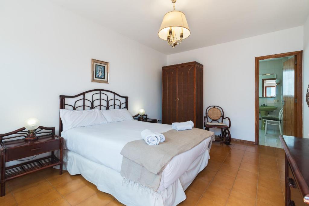 Posteľ alebo postele v izbe v ubytovaní Penthouse Parque Santa Catalina- Ruvimag