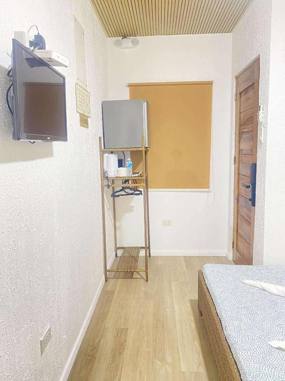 TV a/nebo společenská místnost v ubytování Ecostay Panglao Resort Hotel
