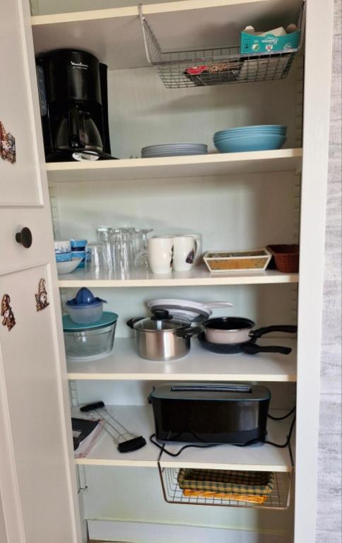 Kuchyň nebo kuchyňský kout v ubytování Deux chambres confortables