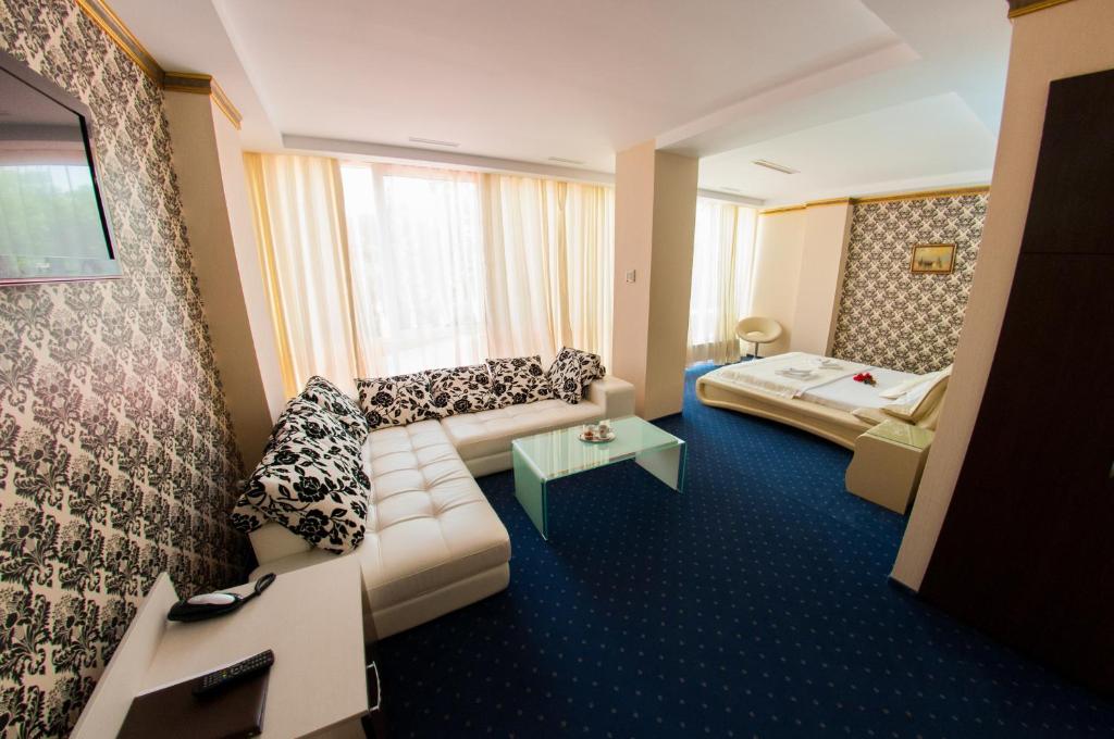 Postel nebo postele na pokoji v ubytování Hotel Boutique Shine