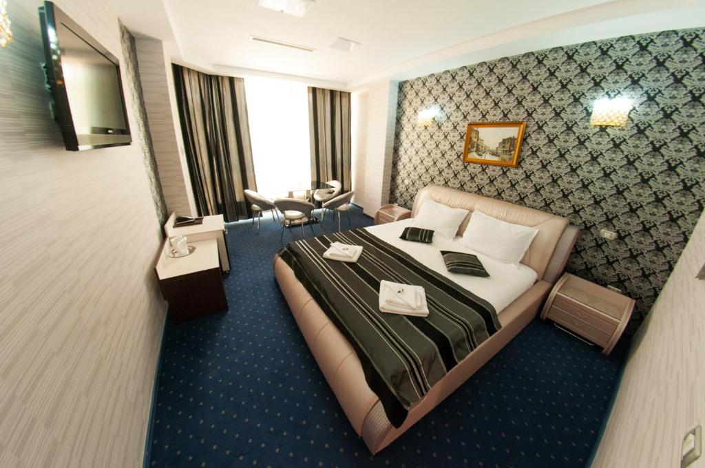 Postel nebo postele na pokoji v ubytování Hotel Boutique Shine