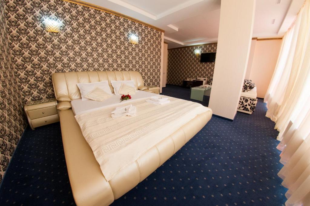 Postel nebo postele na pokoji v ubytování Hotel Boutique Shine