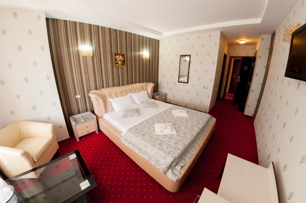 Postel nebo postele na pokoji v ubytování Hotel Boutique Shine