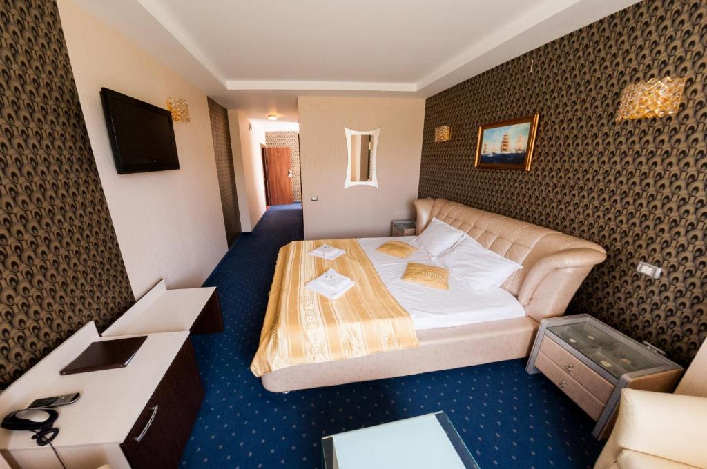 Postel nebo postele na pokoji v ubytování Hotel Boutique Shine