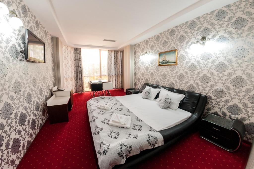 Postel nebo postele na pokoji v ubytování Hotel Boutique Shine