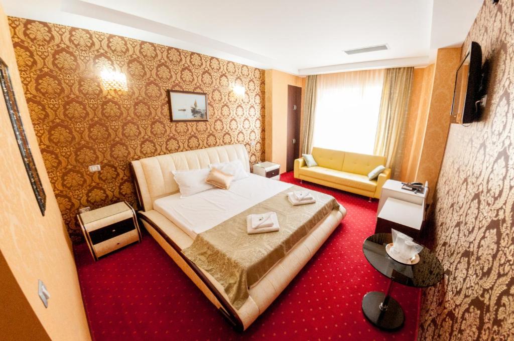 Postel nebo postele na pokoji v ubytování Hotel Boutique Shine