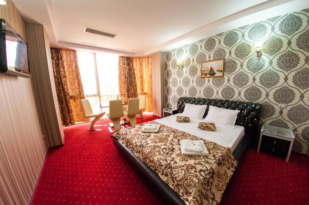 Postel nebo postele na pokoji v ubytování Hotel Boutique Shine